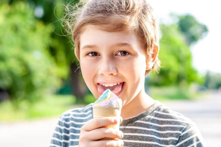 A child licking ice-cream