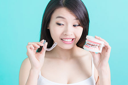 dental patient with invisalign and braces