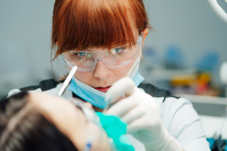 Periodontist with patient