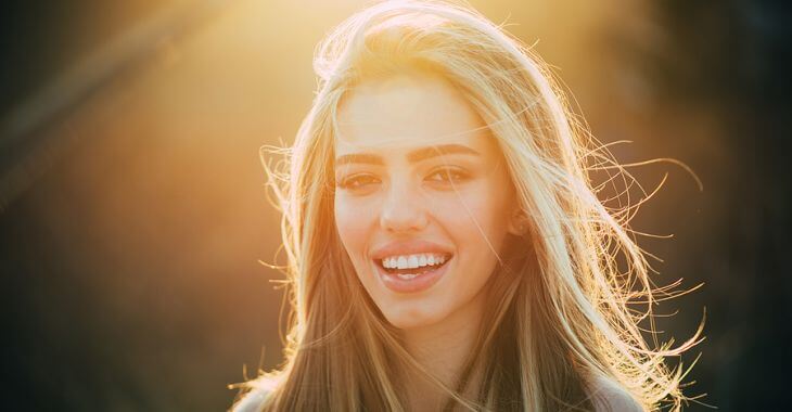 A beautiful young woman with a perfect smile.