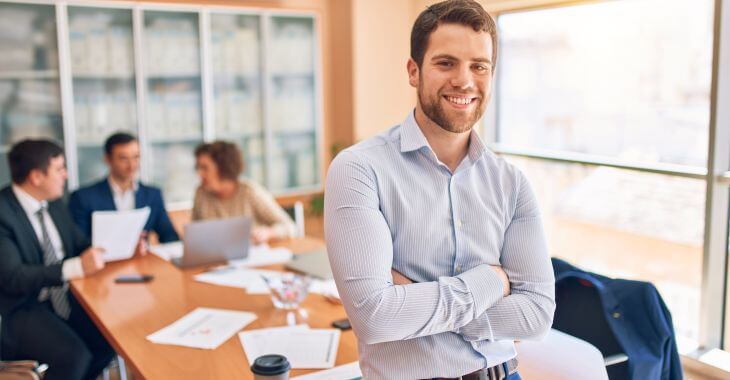 Confident young businessman with perfect smile. during the business meeting